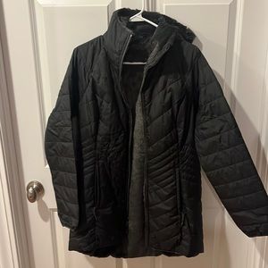Black North Face jacket. Fleece lined and reversible. Mid thigh length.